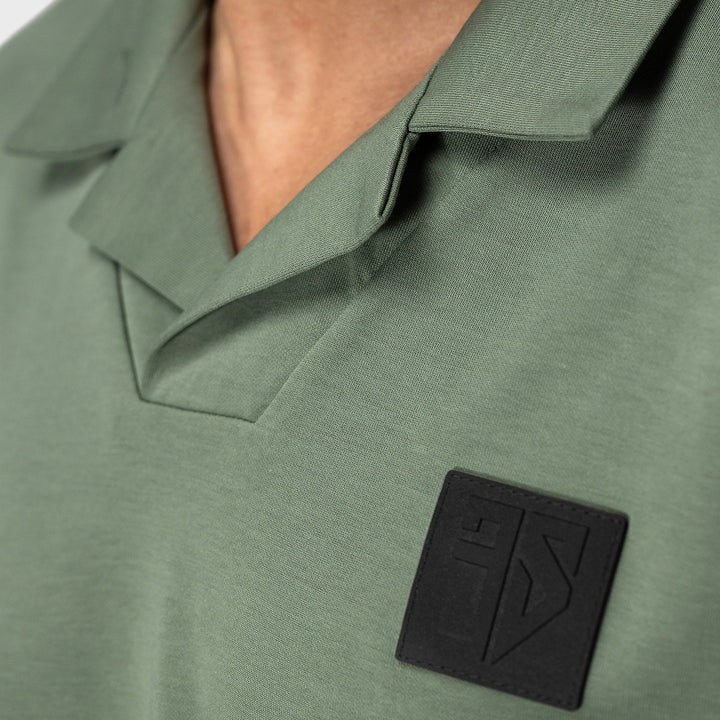 Groene scuba polo detail