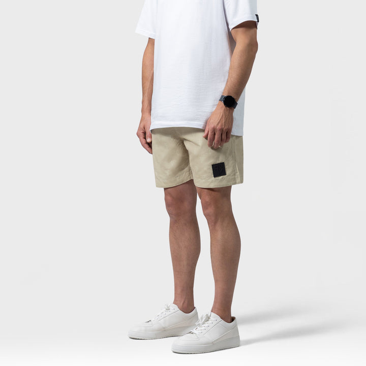 beige heren zwembroek met luge logo print en ritsen in de zak