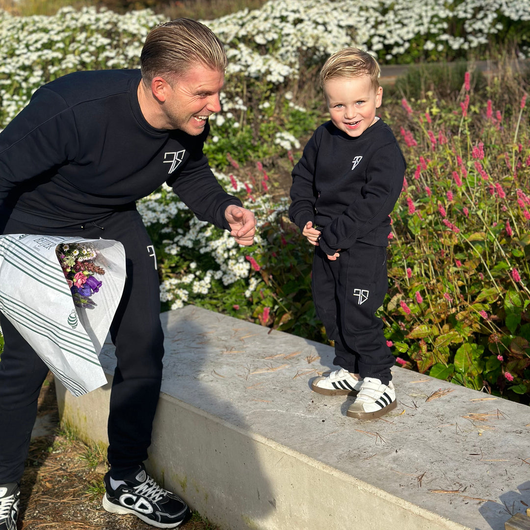 blauw vader zoon trainingspak