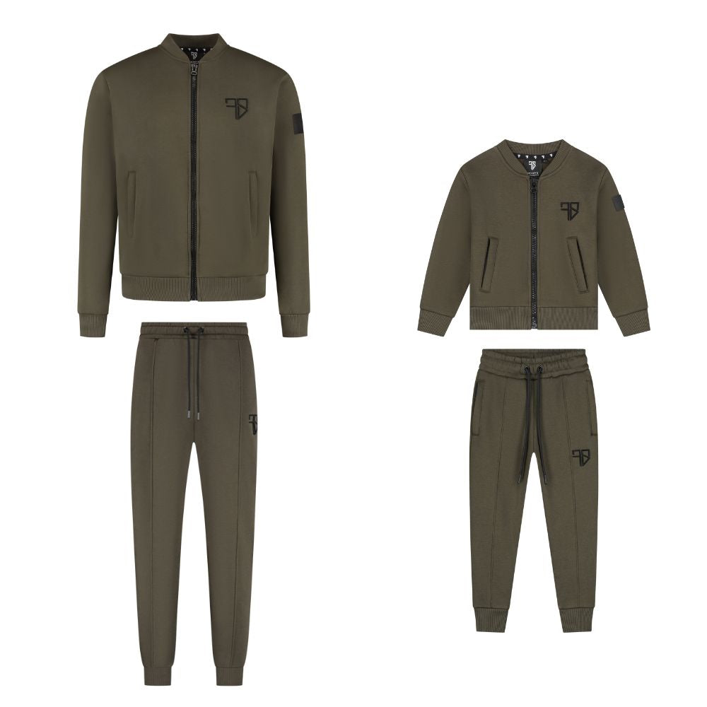 groen vader en zoon trainingspak