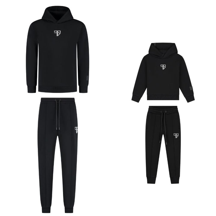 zwart vader en zoon trainingspak