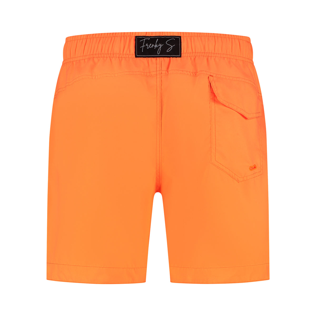 Klein kind in neon oranje twinning zwembroek Frenky S, goed zichtbaar in het water