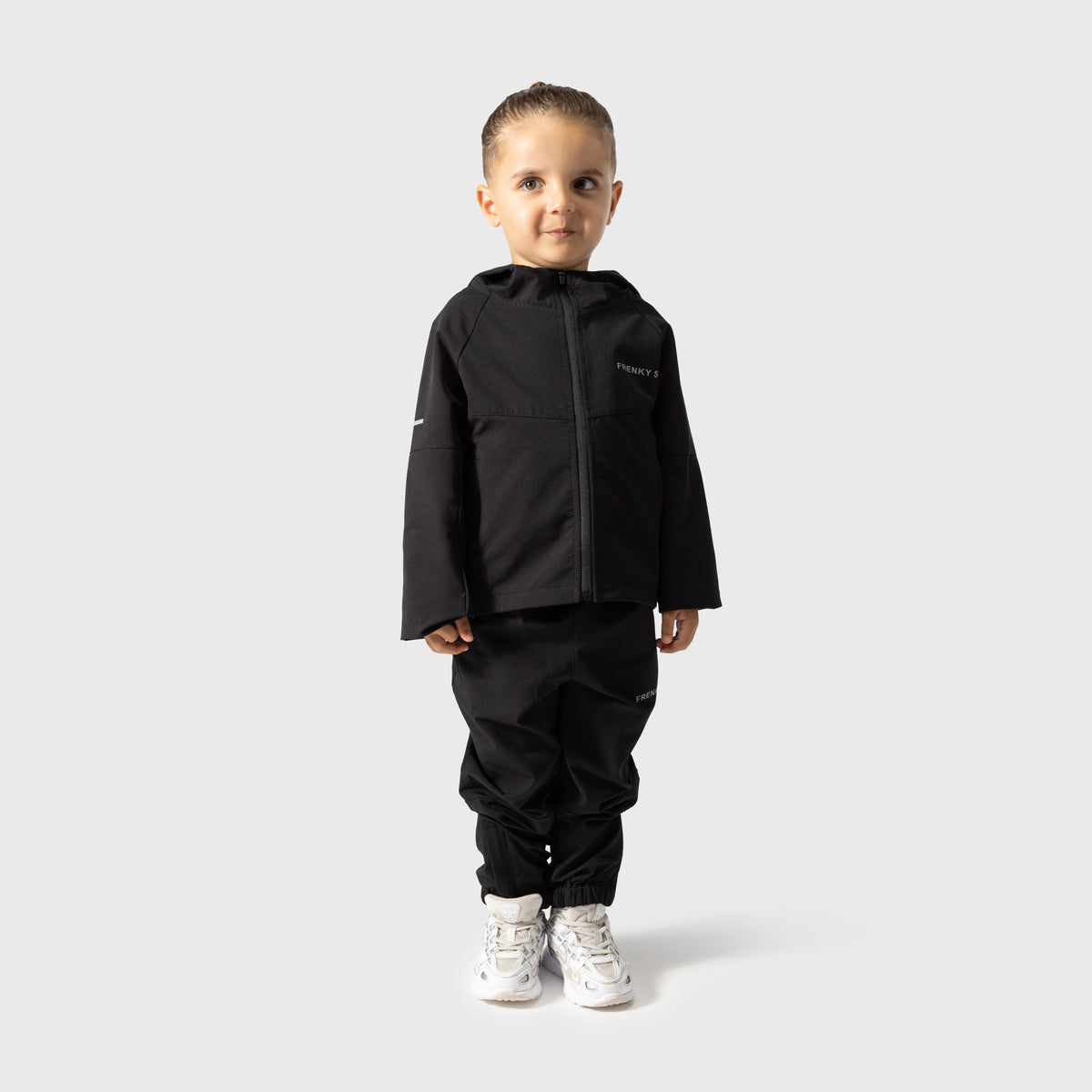 Kinder Tech Suit zwart jongens Frenky S, lifestyle foto